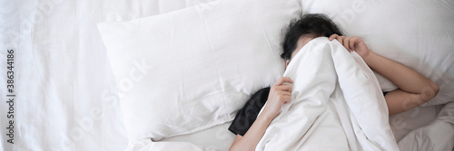 Fotomural Lazy women sleeping on bed in the morning.