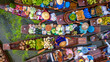 © Kalyakan - Aerial view famous floating market in Thailand, Damnoen Saduak floating market, Farmer go to sell organic products, fruits, vegetables and Thai cuisine, Tourists visiting by boat, Ratchaburi, Thailand
