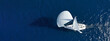 Leinwandbild Motiv Aerial drone ultra wide panoramic photo with copy space of beautiful sailboat with white sails cruising deep blue sea near Mediterranean destination port