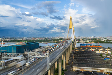 Wall Mural - Large suspension bridge over Chao Phraya river with traffic