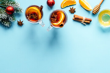 Christmas mulled wine - holiday background with fir branches and spices