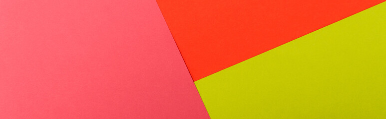 Sticker - top view of colorful abstract red, green and pink paper background, panoramic shot