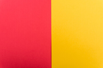 Sticker - top view of colorful abstract yellow, red paper background