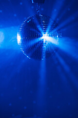 Wall Mural - disco ball background with blue shiny rays