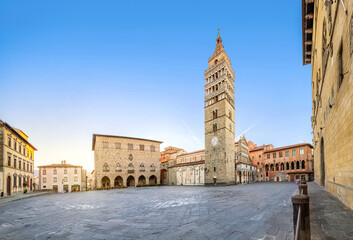 Pistoia, Italy. Panorama of Piazza del Duomo square with old Town Hall and Cathedral of San Zeno on sunrise