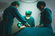 © Supachai - Professional surgical doctor team operating surgery patient in operating room at hospital