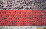Fototapeta Tęcza - Warning bumps for blind people on sidewalk, Belo Horizonte, Brazil