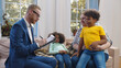 © nimito - Child protection services worker visiting caucasian woman with two adopted children
