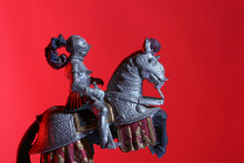 Equestrian Medieval Knight Toy On Red Background