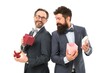 © be free - It is bargain. businessmen in formal suit on party. happy birthday shopping. business partners on meeting isolated on white. success and reward. esthete. bearded men hold valentines present. bargain