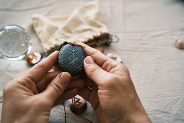 Wall Mural - rune stone good luck and riches talisman with runescript