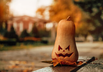 Wall Mural - Evil carved pumpkin for halloween party. Traditional garden decoration