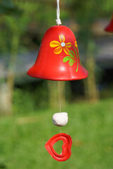 Wall Mural - red ceramic bells hanging on a string