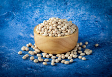 Navy Beans On Blue Background.