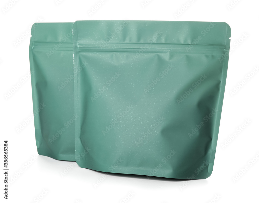 Blank coffee bags on white background