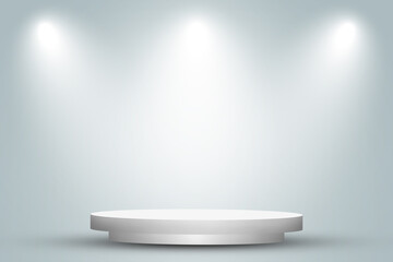 Empty space of Round white podium or pedestal in studio room with spotlight in gray background.