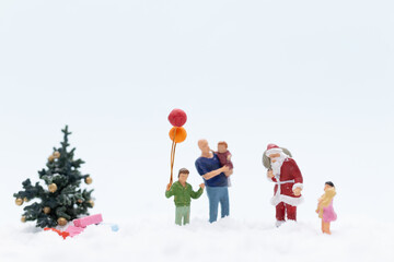 Miniature people, Santa claus and gifts for kid , Christmas and Happy New Year concept.