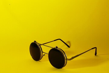 fashion glasses, on a yellow background