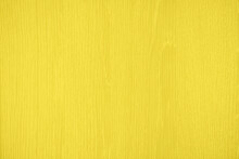 Natural Bright Yellow Wood Texture Background. Wavy Textured Plywood, A Lot Of Fiber And Small Chips, Close-up Abstract Tree Background For Design, Decor And Skins. 2021 Color Trend
