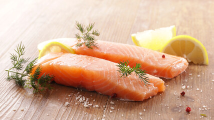 raw salmon fillet and lemon