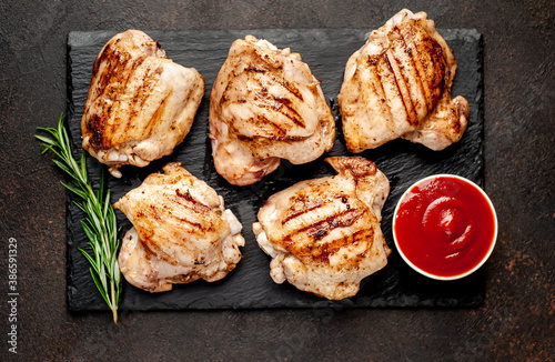 Cuadros en Lienzo grilled chicken thighs without skin on a stone background