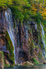 Wall Mural - Waterfalls flowing into the karst lake