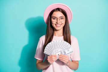 Canvas Print - Portrait of her she nice-looking attractive pretty cheerful cheery girl holding in hands fan cash currency exchange us dollars isolated bright vivid shine vibrant green turquoise color background