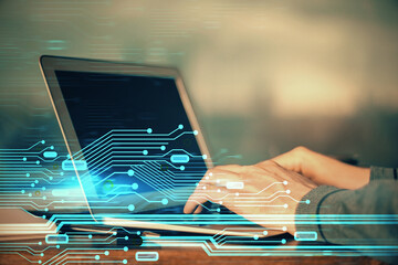 A man working on Laptop with technology theme drawing. Concept of big data. Double exposure.