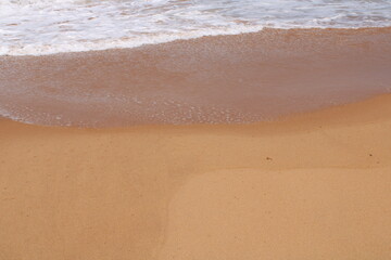 waves on the sand in a desert  beach