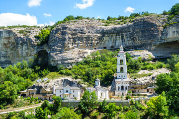 Wall Mural - Panorama of Assumption Cave Monastery & rock canyon, Bakhchysarai, Crimea. Complex was founded in VIII AD