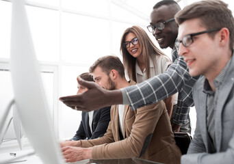 Wall Mural - business team discusses online news