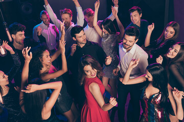 Canvas Print - Attractive elegant cheerful crowd dancing having fun enjoying celebratory corporate event in dark night music club indoors