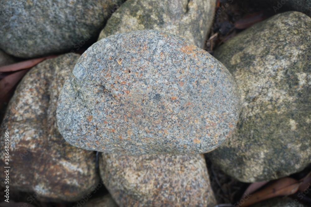 Granite rock on nature background. Granite is a light-colored igneous ...