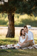 © Andriy Medvediuk - happy family mom dad and baby son happy in nature spending time together on summer sunny day. The concept of a fun holiday outdoors. Happy childhood.
