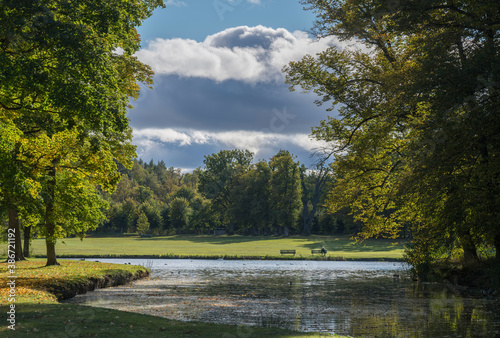 Fotomural Autumn park view over the meadows, ponds and trees in the park on the Drottningh