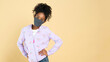 © Agnes Lopez - Pretty young african american girl wearing a mask