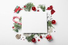 Flat Lay Composition With Christmas Decor And Blank Card On White Background. Space For Text