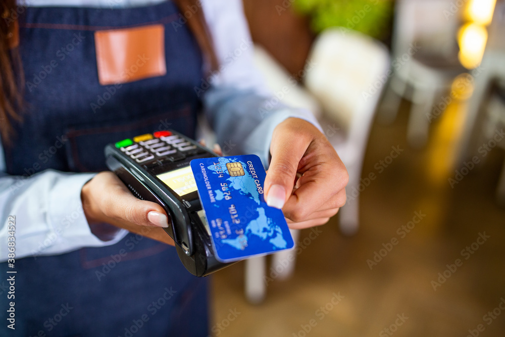 Contactless payment concept, female holding credit card near nfc ...