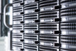 Cluster of data storage hard drives inside server room