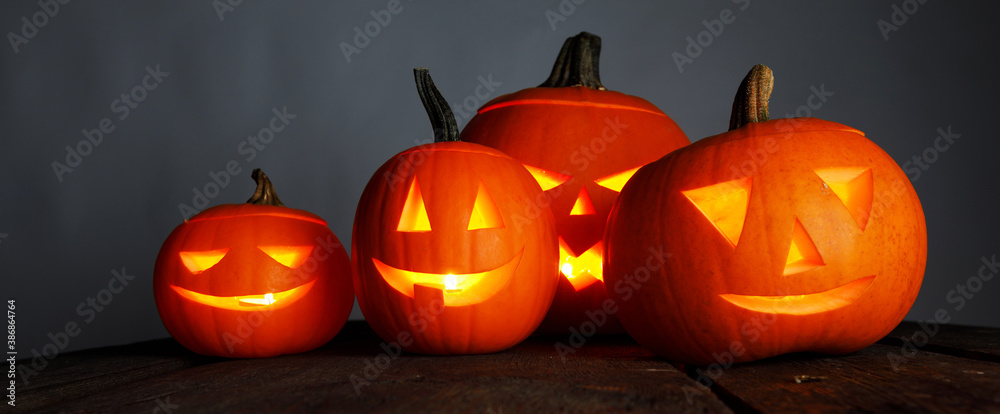 Halloween pumpkins and candles - obrazy, fototapety, plakaty 