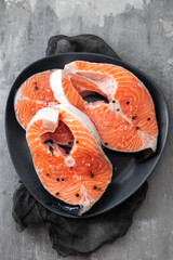 Sticker - fresh raw salmon with black pepper on dish