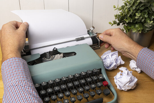 write with an old typewriter on a white table