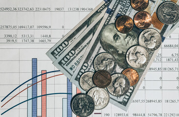 Wall Mural - Economic growth and investment. Dollar bills and charts and graphs of financial indicators