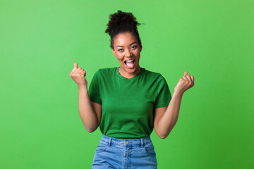 Close up portrait of screaming happy young black woman