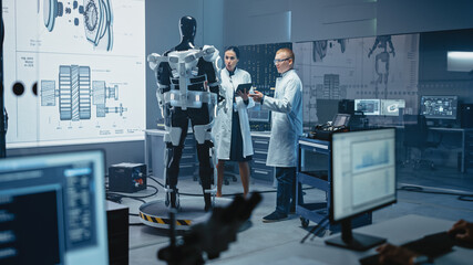 Poster - In Robotics Development Laboratory: Chief Female Engineer and Top Male Scientist Work on a Bionics Exoskeleton Prototype. Designing Powered Exosuit to Help Disabled People, Hard Labor Workers