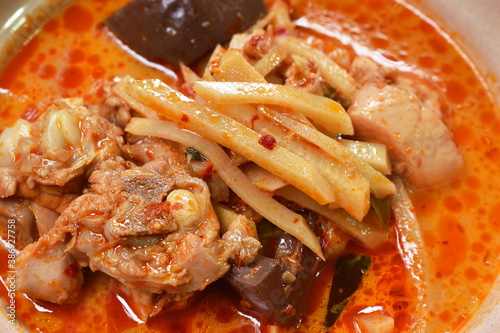 Cuadros en Lienzo spicy boiled slice fresh bamboo shoot with chicken and blood in coconut milk cur