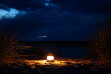A Lantern With A Candle At Night, Romantic Evening At The Beach.