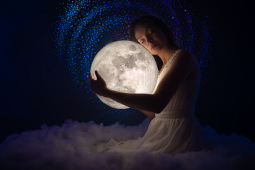 Wall Mural - attractive young woman in white air dress hugs the moon on amazing starry sky with and soft clouds h