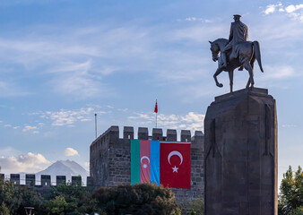 Azerbaijan and Turkish flags side by side in the castle. Atatürk statue in Kayseri Cumhuriyet Square