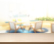 © nuttapol - Table Top And Blur Living Room Of  Background